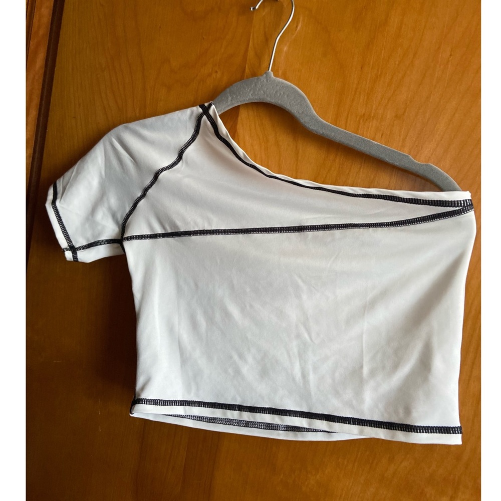 Two piece set. Black and white stitched.